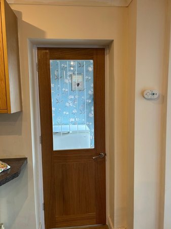 Removal of arch, plastering, door frame and oak door fitting.